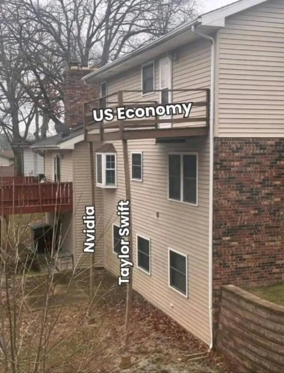 The US Economy as a balcony on the third floor held up by two extremely distressed legs labeled NVIDIA and Taylor Swift.