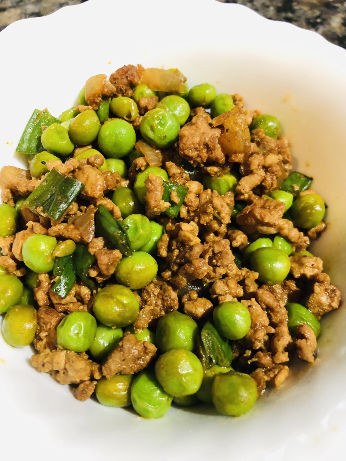 Ground pork, green peas, green onions