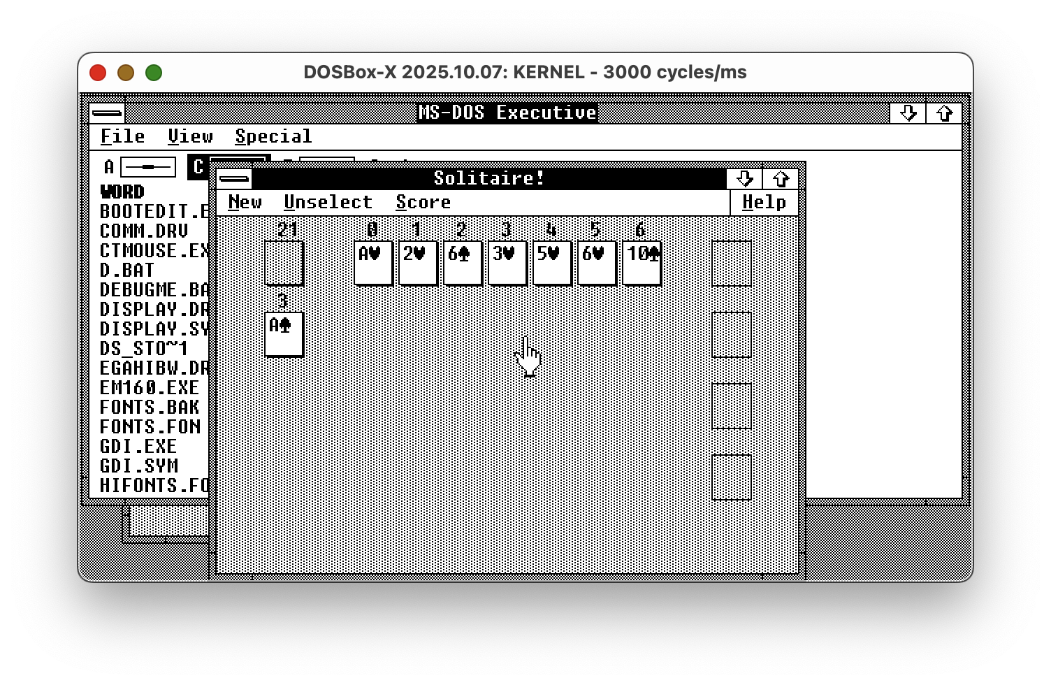Windows 2 running in Dosbox - showing MS-DOS Executive file manager and Solitaire. Except it uses Windows 1 video driver