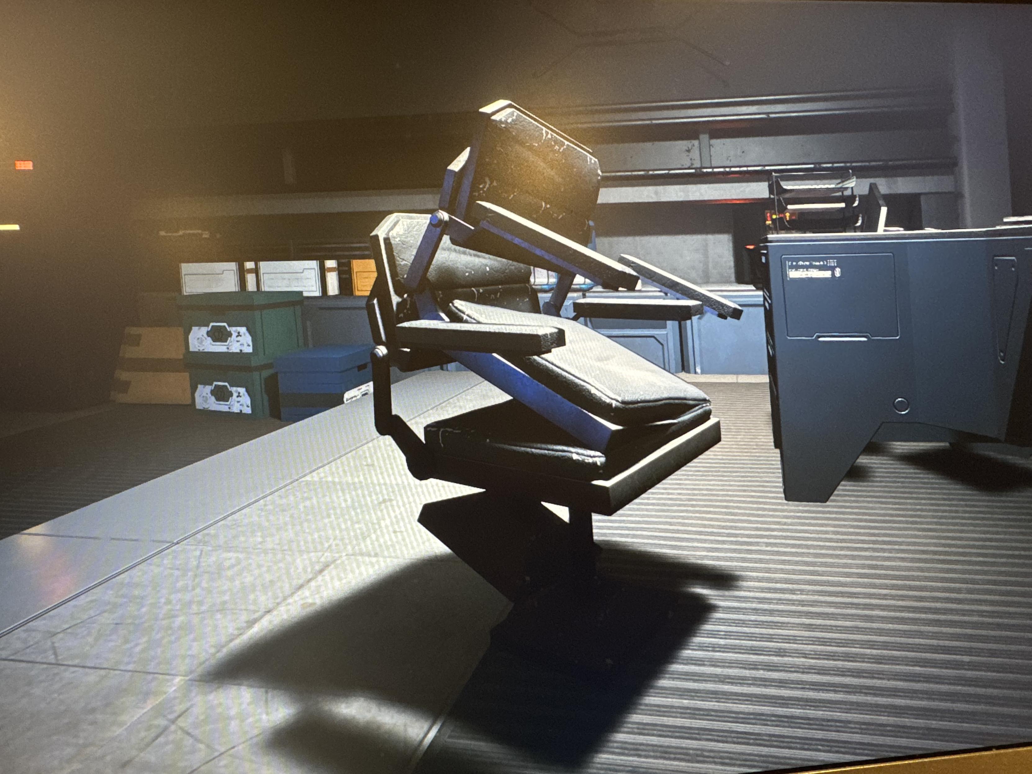 Two identical chairs clipping into one another